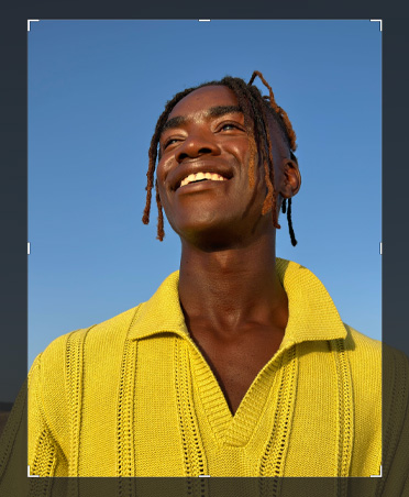 Photo of man in yellow shirt, cropping tool